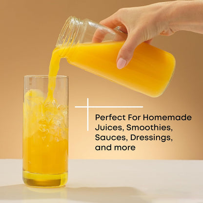 JoyJolt 16 oz Reusable Glass Bottles with Caps. Set of 8 Juicing Bottles With Lids and Juice Jars Labels. Glasses for Cold Brew, Smoothie